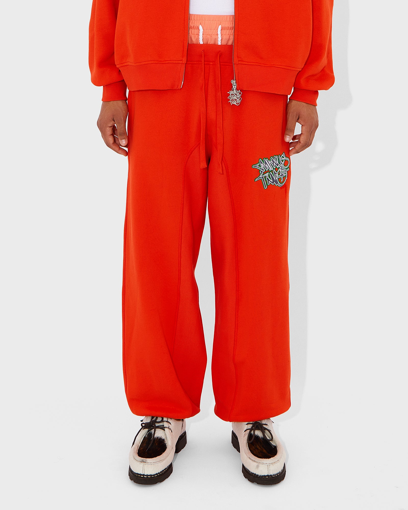 Jogginghose mit orangefarbenem Stack-Logo